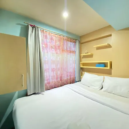 Homey Living 2Br At Jarrdin Cihampelas Apartment By Travelio